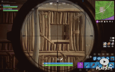A Screenshot Of A Video Game Called Fortnite Shows A Sniper Aiming At A Building GIF