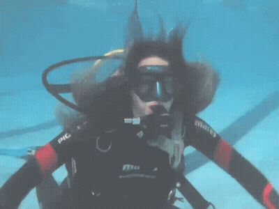 A Scuba Diver Wearing A Mares Wet Suit GIF