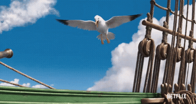 A Seagull Is Flying Over A Green Ship With A Netflix Logo In The Corner GIF