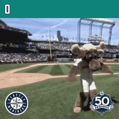 A Seattle Mariners Mascot Is Dancing On The Field GIF