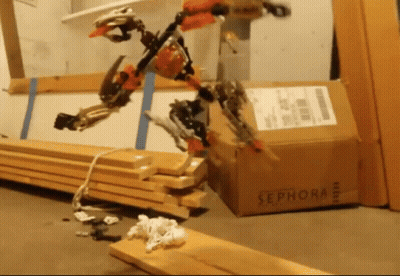 A Sephora Box Sits On The Floor Next To A Stack Of Wood GIF