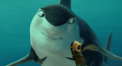 A Shark And A Fish Are Swimming Together In The Water GIF