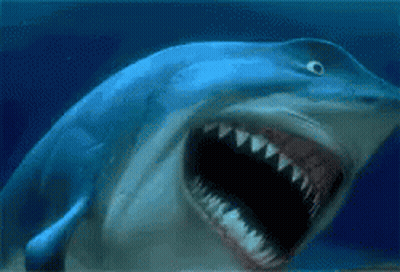 A Shark With Its Mouth Open Is Swimming In The Water GIF