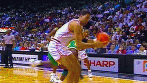 A Sharp Advertisement Is On The Side Of The Court GIF