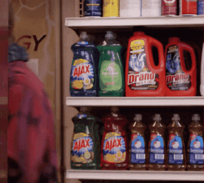 A Shelf Full Of Dish Soap Including Ajax Anddrano GIF