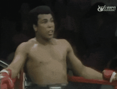 A Shirtless Boxer In A Boxing Ring With Espn Classic Written On The Bottom GIF