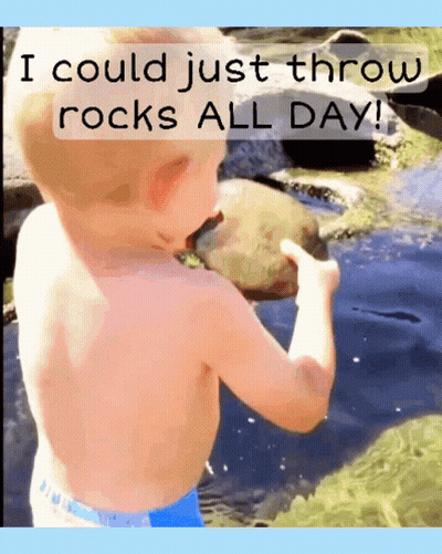 A Shirtless Child Is Holding A Rock In Front Of A River And Says I Could Just Throw Rocks All Day GIF