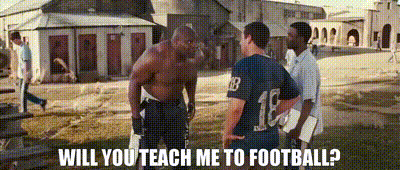 A Shirtless Football Player With The Number 18 On His Jersey GIF