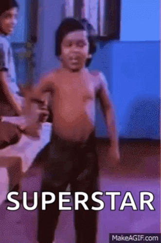A Shirtless Little Boy Is Dancing In A Room With The Words `` Superstar '' Written On The Bottom . GIF