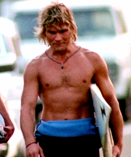 A Shirtless Man Carrying A Surfboard With A Star On The Front GIF