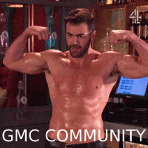 A Shirtless Man Flexes His Muscles In Front Of A Gmc Community Sign GIF