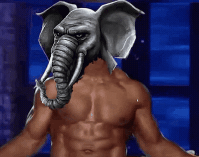 A Shirtless Man Has An Elephant Mask On His Face GIF
