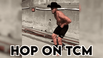 A Shirtless Man In A Cowboy Hat Is Jumping In The Air With The Words Hop On Tcm Above Him GIF