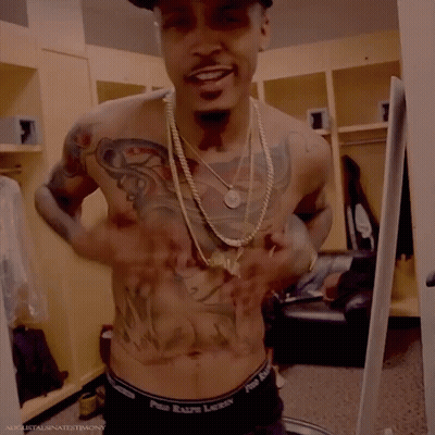 A Shirtless Man In A Locker Room With A Hat That Says Bully GIF