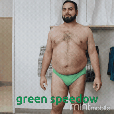 A Shirtless Man In Green Underwear With The Words Green Speedow Mintmobile On The Bottom GIF