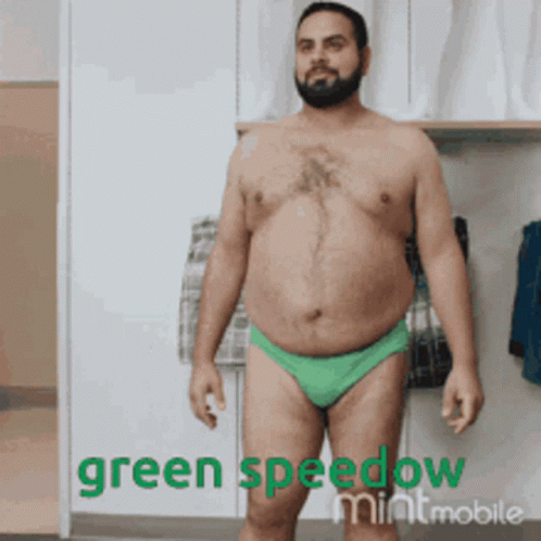 A Shirtless Man In Green Underwear With The Words Green Speedow Mintmobile On The Bottom Right GIF