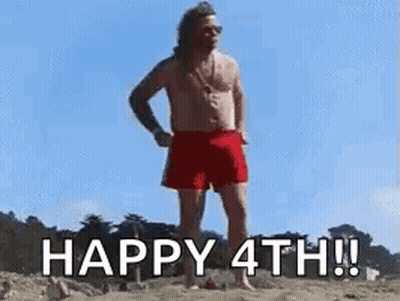 A Shirtless Man In Red Shorts Is Standing On A Beach And Says `` Happy 4Th ! '' GIF