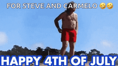 A Shirtless Man In Red Shorts Stands On A Beach With The Words " For Steve And Carmelo Happy 4Th Of July " Above Him GIF