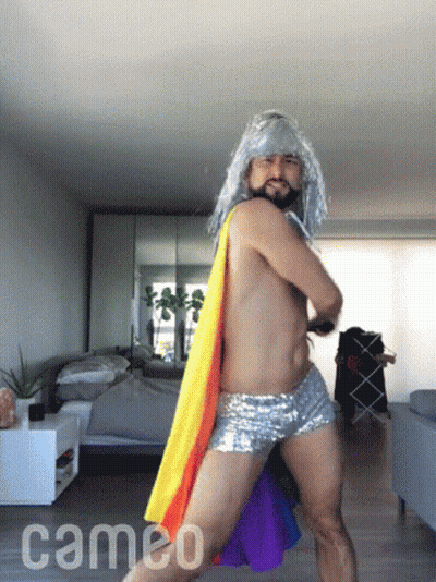 A Shirtless Man Is Dancing In A Room With The Word Cameo On The Floor GIF
