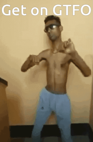A Shirtless Man Is Dancing With The Words Get On Gtfo Written Above Him GIF