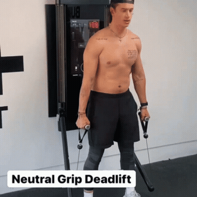 A Shirtless Man Is Doing A Neutral Grip Deadlift On A Machine GIF