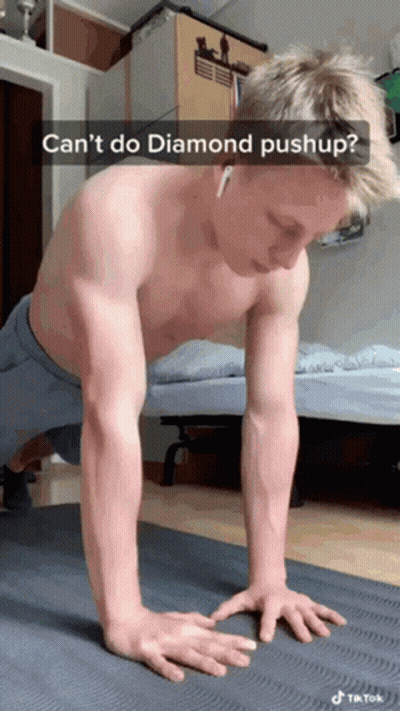 A Shirtless Man Is Doing Push Ups On A Yoga Mat With The Caption " Can 'T Do Diamond Pushup " GIF