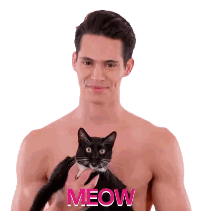 A Shirtless Man Is Holding A Black Cat With The Word Meow Written In Pink Sticker