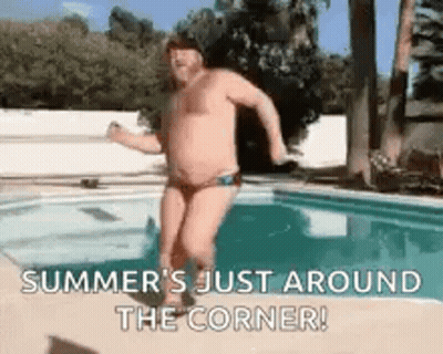 A Shirtless Man Is Jumping Into A Swimming Pool With The Words `` Summer 'S Just Around The Corner '' . GIF