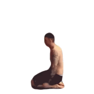 A Shirtless Man Is Kneeling Down In Front Of A Wall With His Arms Outstretched Sticker