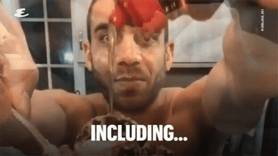 A Shirtless Man Is Pouring Ketchup On His Face With The Words Including Written On The Bottom GIF