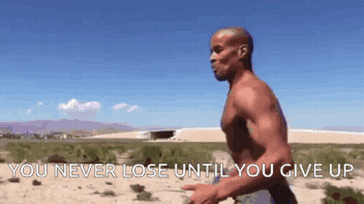 A Shirtless Man Is Running In The Desert With The Words " You Never Lose Until You Give Up " Behind Him GIF