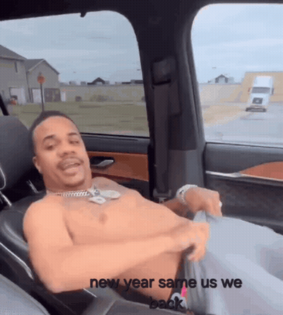 A Shirtless Man Is Sitting In The Back Seat Of A Car With The Words New Year Same Us We Back GIF