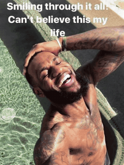 A Shirtless Man Is Smiling In Front Of A Pool With The Caption Smiling Through It All GIF