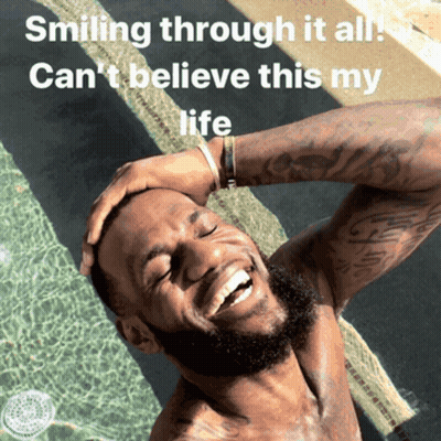A Shirtless Man Is Smiling In Front Of A Pool With The Words Smiling Through It All Can 'T Believe This My Life GIF