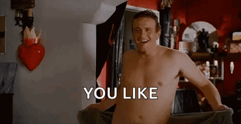 A Shirtless Man Is Standing In A Bathroom With A Towel Around His Waist And The Words `` You Like '' . GIF