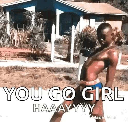 A Shirtless Man Is Standing In Front Of A House With The Words You Go Girl Haaayyy Written On It GIF