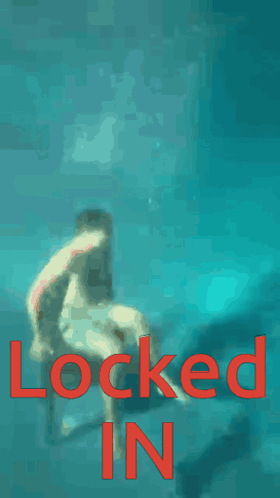A Shirtless Man Is Standing In The Water With The Words Locked In In Red GIF