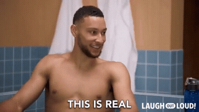 A Shirtless Man Is Taking A Bath In A Bathtub And Saying This Is Real Laugh Out Loud . GIF