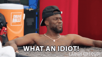 A Shirtless Man Laying In A Tub With The Words What An Idiot Laugh Out Loud GIF
