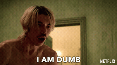 A Shirtless Man Says " I Am Dumb " In Front Of A Netflix Logo GIF