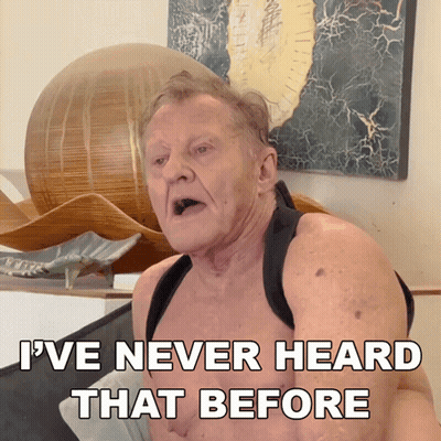A Shirtless Man Says " I 'Ve Never Heard That Before " In Front Of A Painting GIF