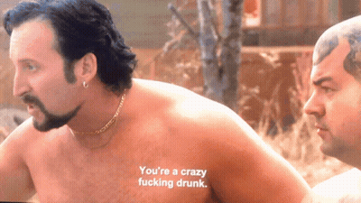 A Shirtless Man Says " You 'Re A Crazy Fucking Drunk " Next To Another Shirtless Man GIF