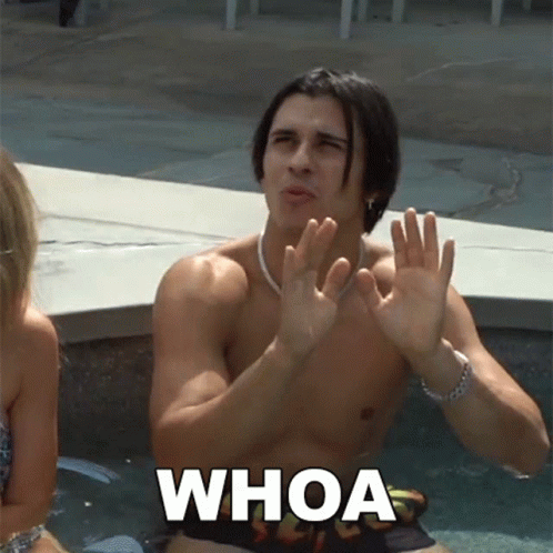A Shirtless Man Sitting In A Pool With The Word Whoa Written On The Bottom GIF