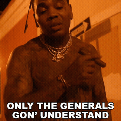 A Shirtless Man Smoking A Cigar With The Words Only The Generals Gon ' Understand Above Him GIF