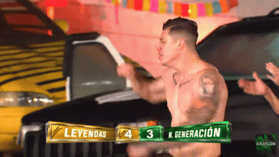 A Shirtless Man Stands In Front Of A Sign That Says N. Generacion On It GIF