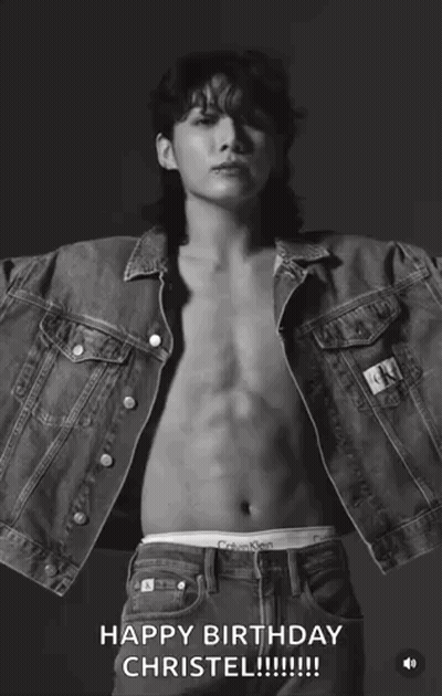 A Shirtless Man Wearing A Calvin Klein Denim Jacket GIF