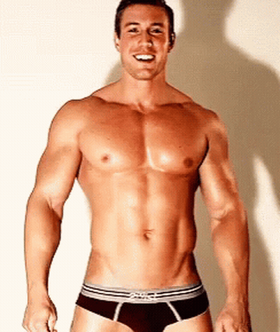 A Shirtless Man Wearing A Pair Of Briefs With The Word Briefs On The Front GIF
