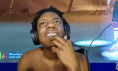A Shirtless Man Wearing Headphones And A Microphone Is Looking Up . GIF