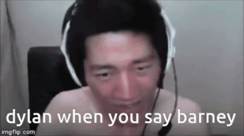 A Shirtless Man Wearing Headphones And A Microphone Is Talking To Someone . GIF