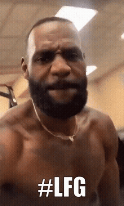 A Shirtless Man With A Beard Is Making A Funny Face And Says # Lfg GIF